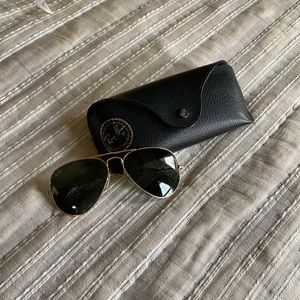 Ray-Ban aviator sunglasses.